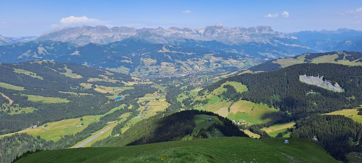 The Megève valley and the Aravis mountains seen from the Mont Joly ridge in summer, the landscape around Four Seasons Resort Megève rather than the resort itself