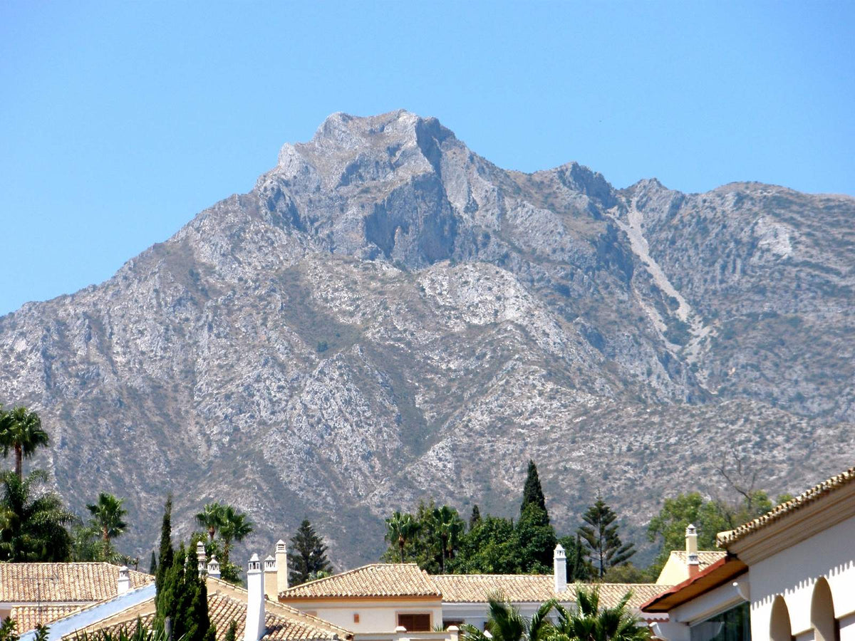 The peak of La Concha rising above Marbella