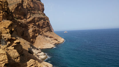 A limestone cliff of the Sierra Helada natural park falling to the Mediterranean near Albir and L'Alfas del Pi, Alicante