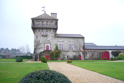 Chateau Smith Haut Lafitte's ivy covered tower and lawn, the Bordeaux grand cru classe estate that surrounds Les Sources de Caudalie