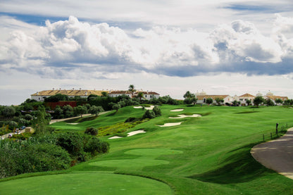 The golf course and hacienda-style buildings at Finca Cortesín, above the Costa del Sol