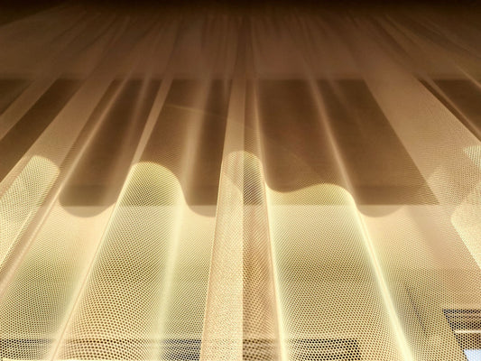 Warm sunlight pouring through fine gauze, the light a spa on the tenth floor gets and a basement never does