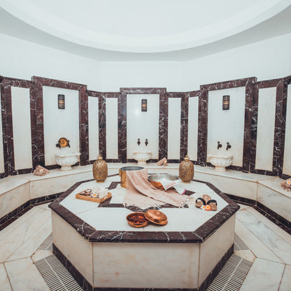 Marble hammam interior with an octagonal heated stone platform