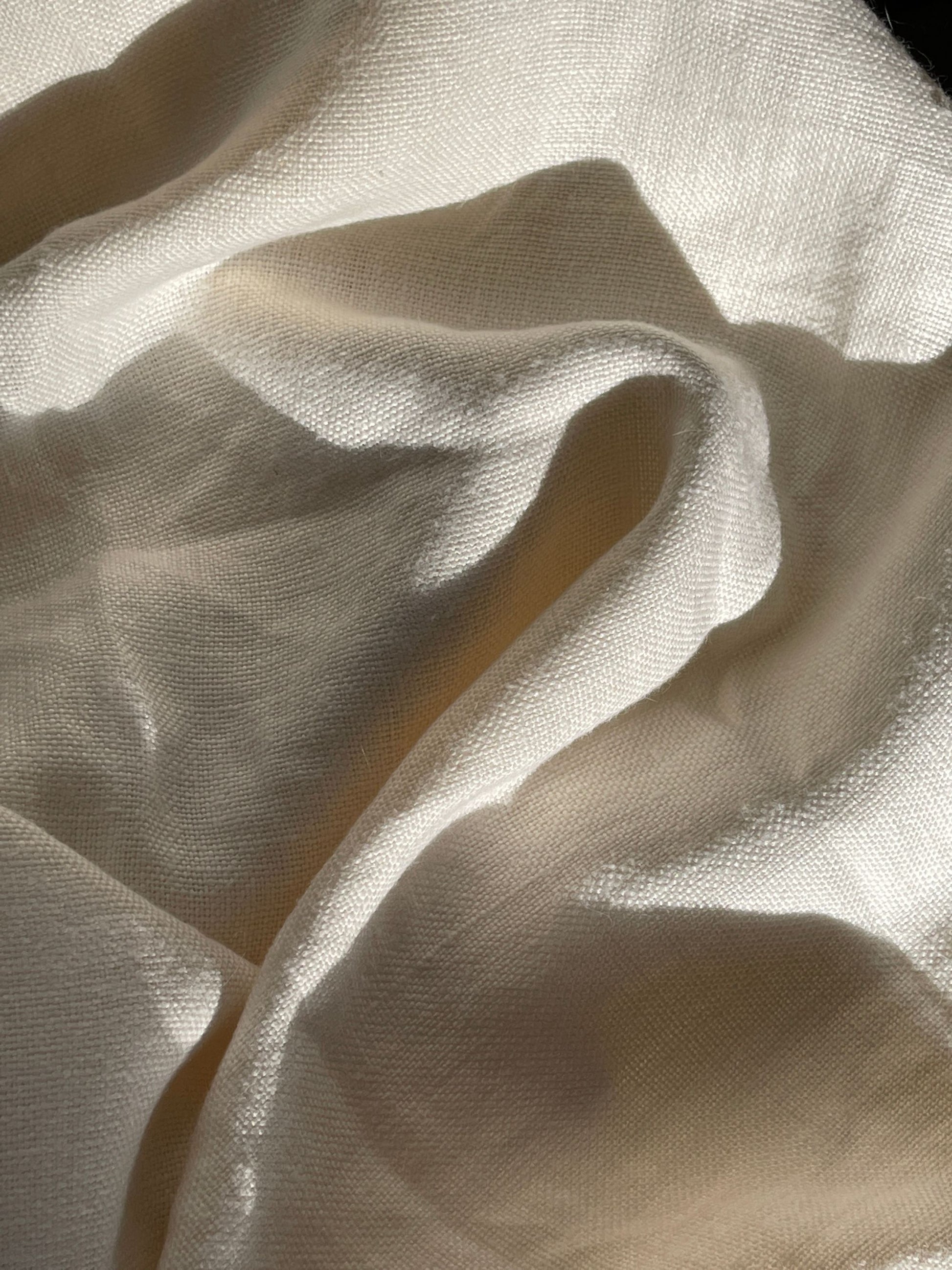Soft white cloth in gentle light, Lanserhof at The Arts Club