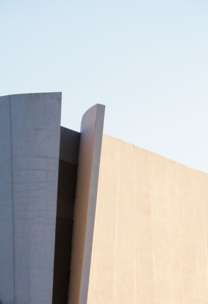 A close up of a modern building facade, evoking the deliberately modern spa building set against the historic manor