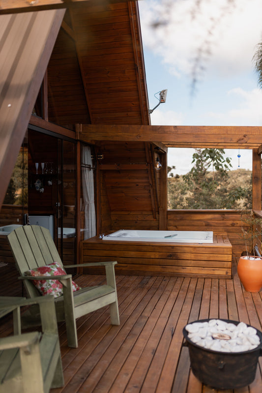 A timber sauna with a window looking straight out into the garden, Fieldhouse Spa at THE PIG in the Cotswolds