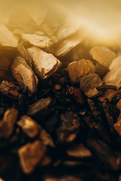 Close up of warm sunlit stones with golden light
