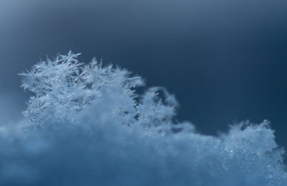 Macro detail of frost and ice crystals, evocative of a cold therapy shower