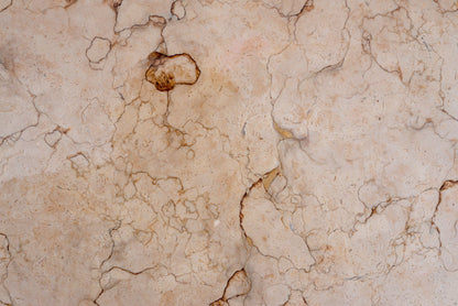 Warm cream stone with soft organic veining running through it, the Vicenza stone of the pool hall at The Bvlgari Spa, Knightsbridge