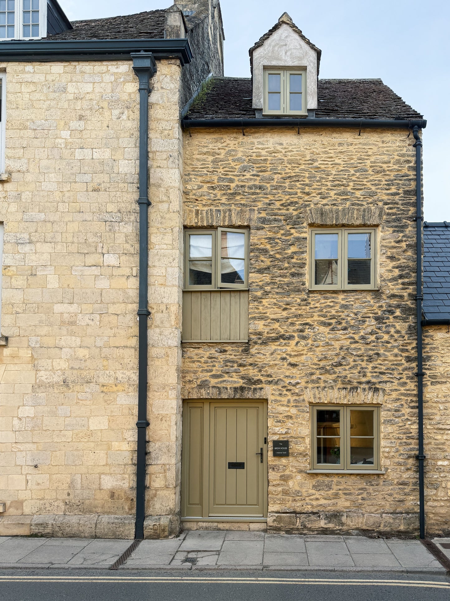 Honey coloured Cotswold stone laid around a window, The Spa at Ellenborough Park, Cheltenham