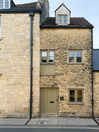Honey coloured Cotswold stone laid around a window, The Spa at Ellenborough Park, Cheltenham