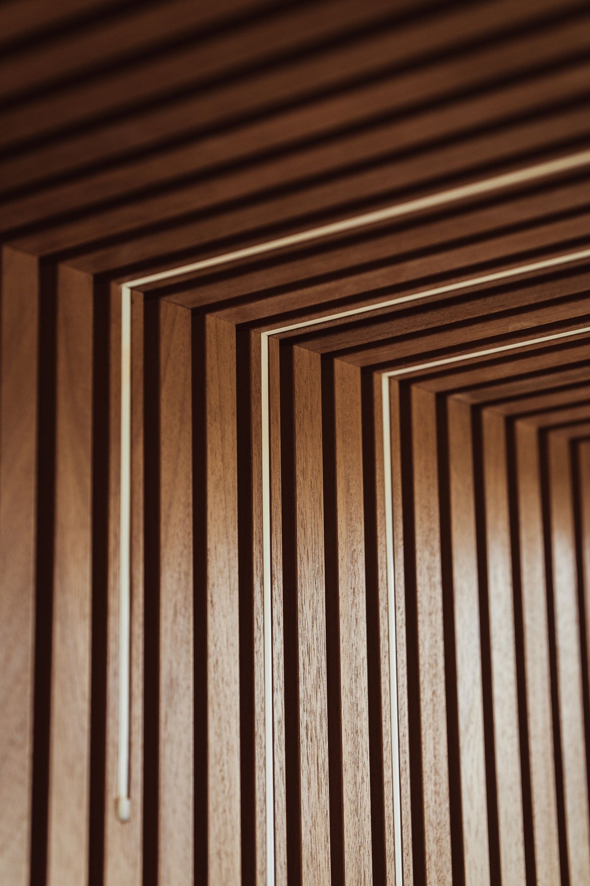 Warm wood panelling lines a sauna interior.