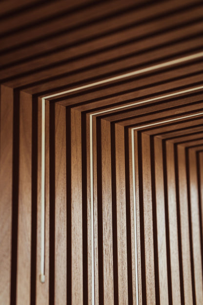 Warm wood panelling lines a sauna interior.