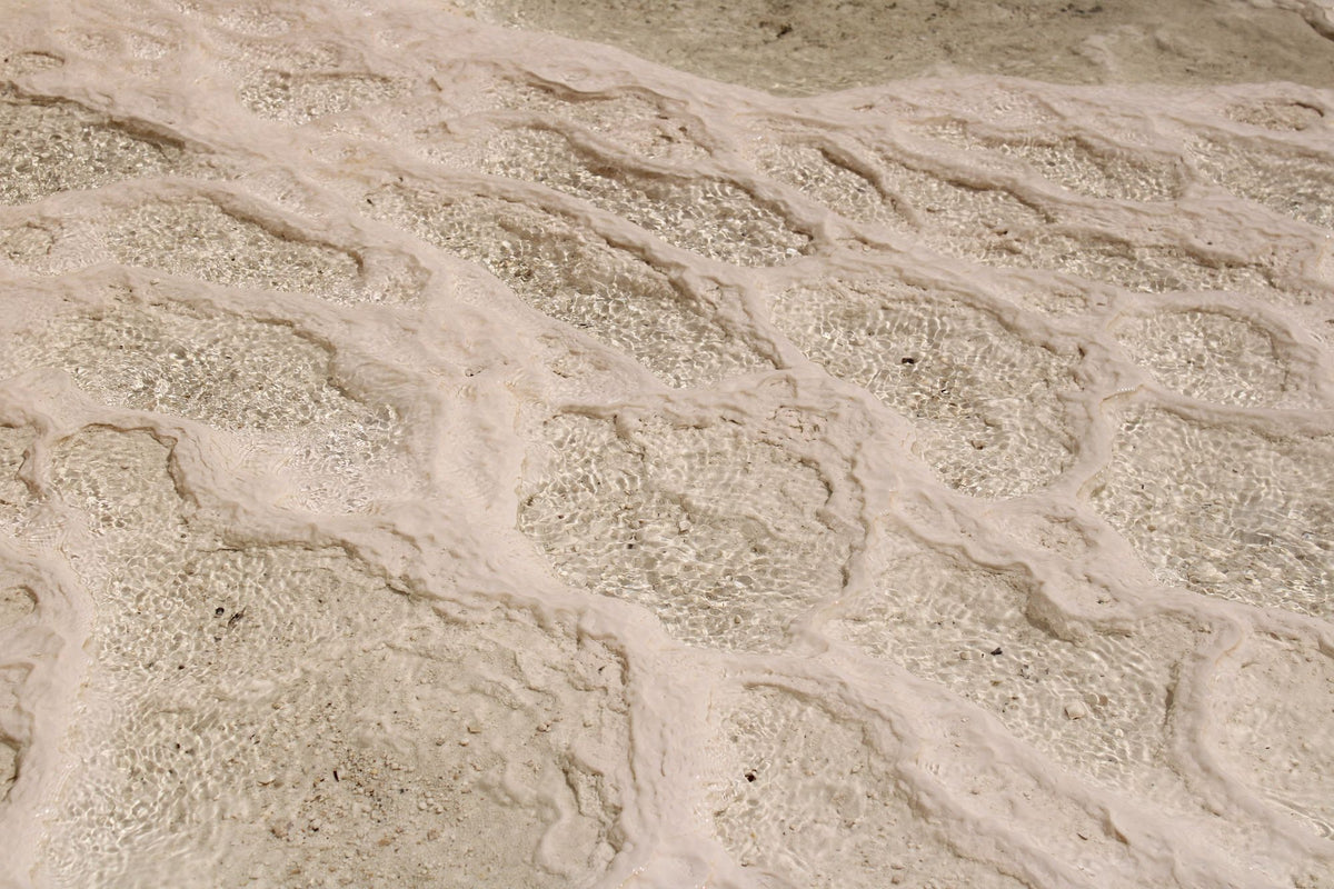 Ripples of mineral rich thermal water catching the light