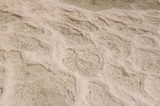 Ripples of mineral rich thermal water catching the light