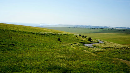 Rolling green South Downs hills under an open sky