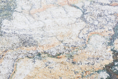 Close detail of pale veined marble, the material used across Palace Merano's renovated spa floor