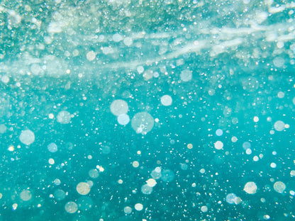 Close up of turquoise water bubbling in a vitality pool at The Bath House Spa, Royal Crescent