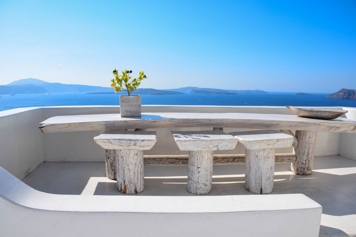 A whitewashed terrace with sea view, evoking the hilltop setting above Anacapri