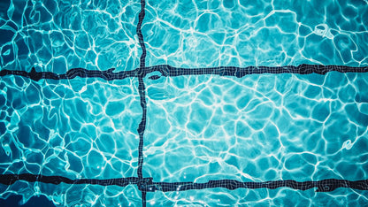 Light shifting across the tiled surface of a turquoise indoor pool, Guerlain Spa at Raffles London, The OWO