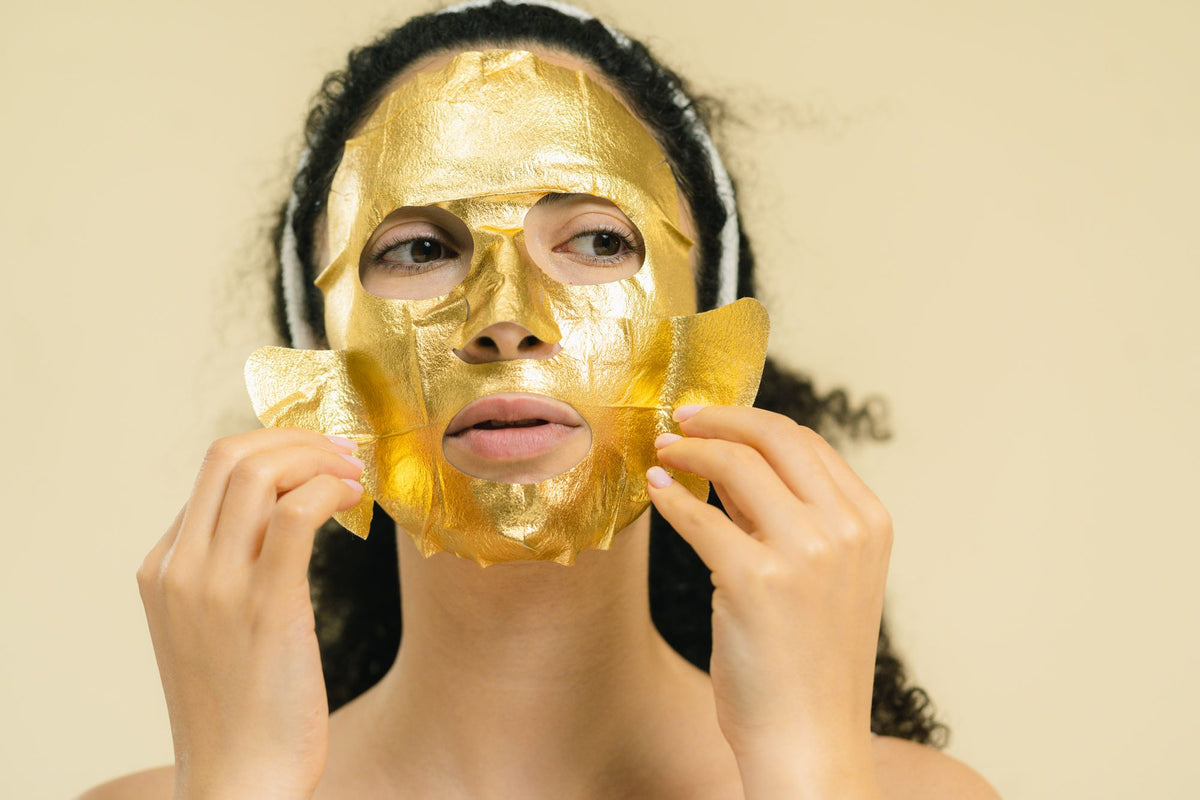 A golden facial mask applied at the spa, evoking the gold treatments among the three skincare houses run side by side at Four Seasons Hampshire