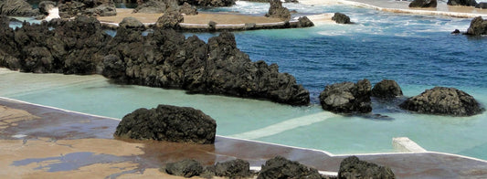 Turquoise natural pool meeting the deep blue Atlantic near The Scarlet Spa, Mawgan Porth